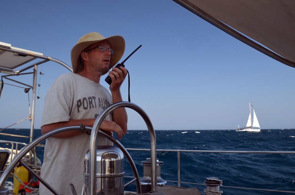Chatting with a buddy boat underway